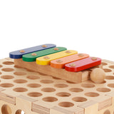 xylophone toy on muro activity board