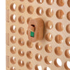 wooden light switch toy on activity board
