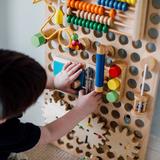 Muro toys are high quality wooden play centres that come with loads of toys including abacus, bead maze and peg slider.